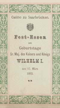 Deckblatt der Menükarte zu einem Festessen anlässlich des Geburtstages des Kaisers und Königs im Saarbrücker Casino im Jahr 1883 (Foto: Stadtarchiv)