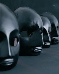 Black masks in a row