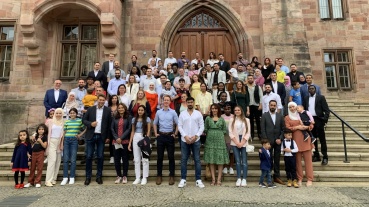 Saarbrücken würdigt Eingebürgerte mit Feier in Festsaal Image