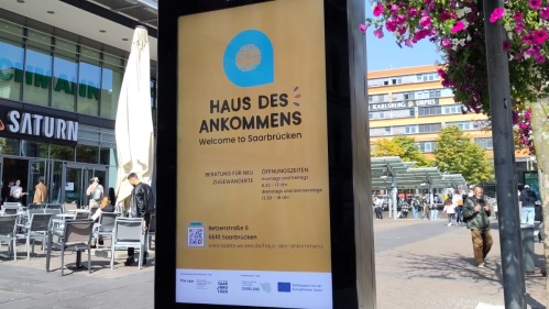 digitale Werbung für das Haus des Ankommens