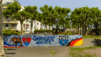 Graffiti auf den Mauern des unteren Nanteser Platzes mit Symbolen aus den Partnerstädten Saarbrücken-Nantes 