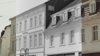Ansicht der Bahnhofstraße mit Einkaufsläden - moderne und alte Fassade im Foto abgebildet